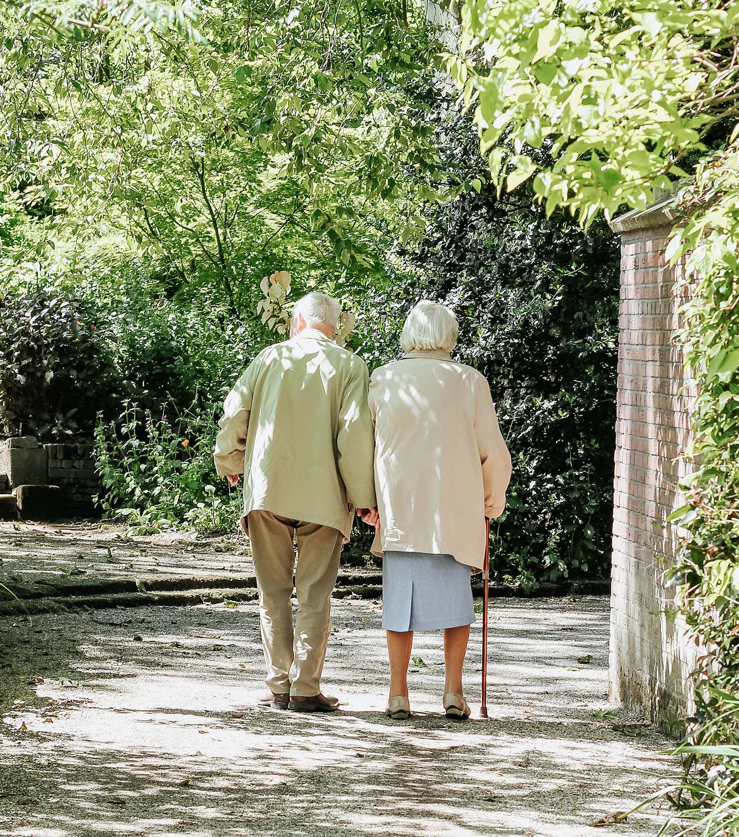 Old couple walking together