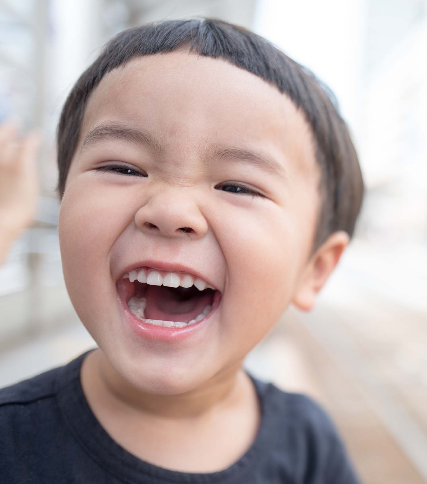 Young boy laughing